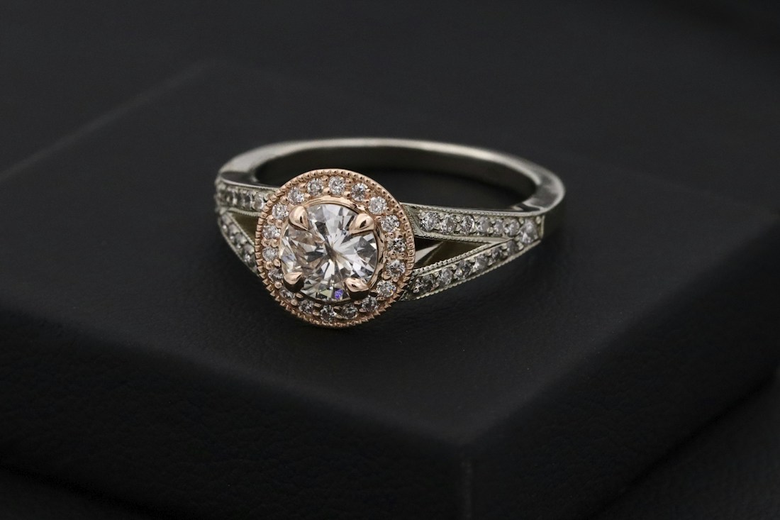 Gold ring with a luminous stone